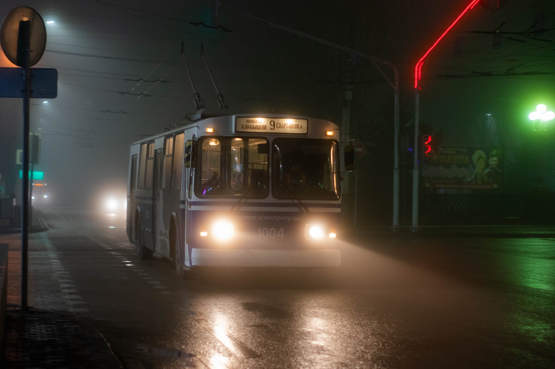 old trolleybus riding on night street
