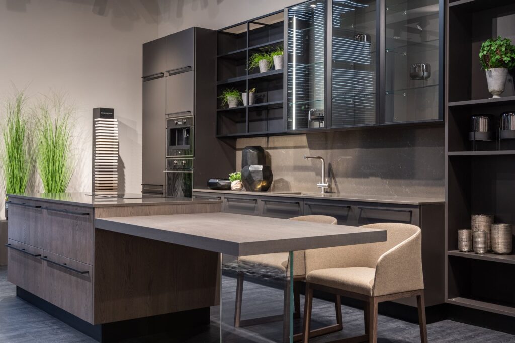 stylish dark kitchen interior in modern apartment