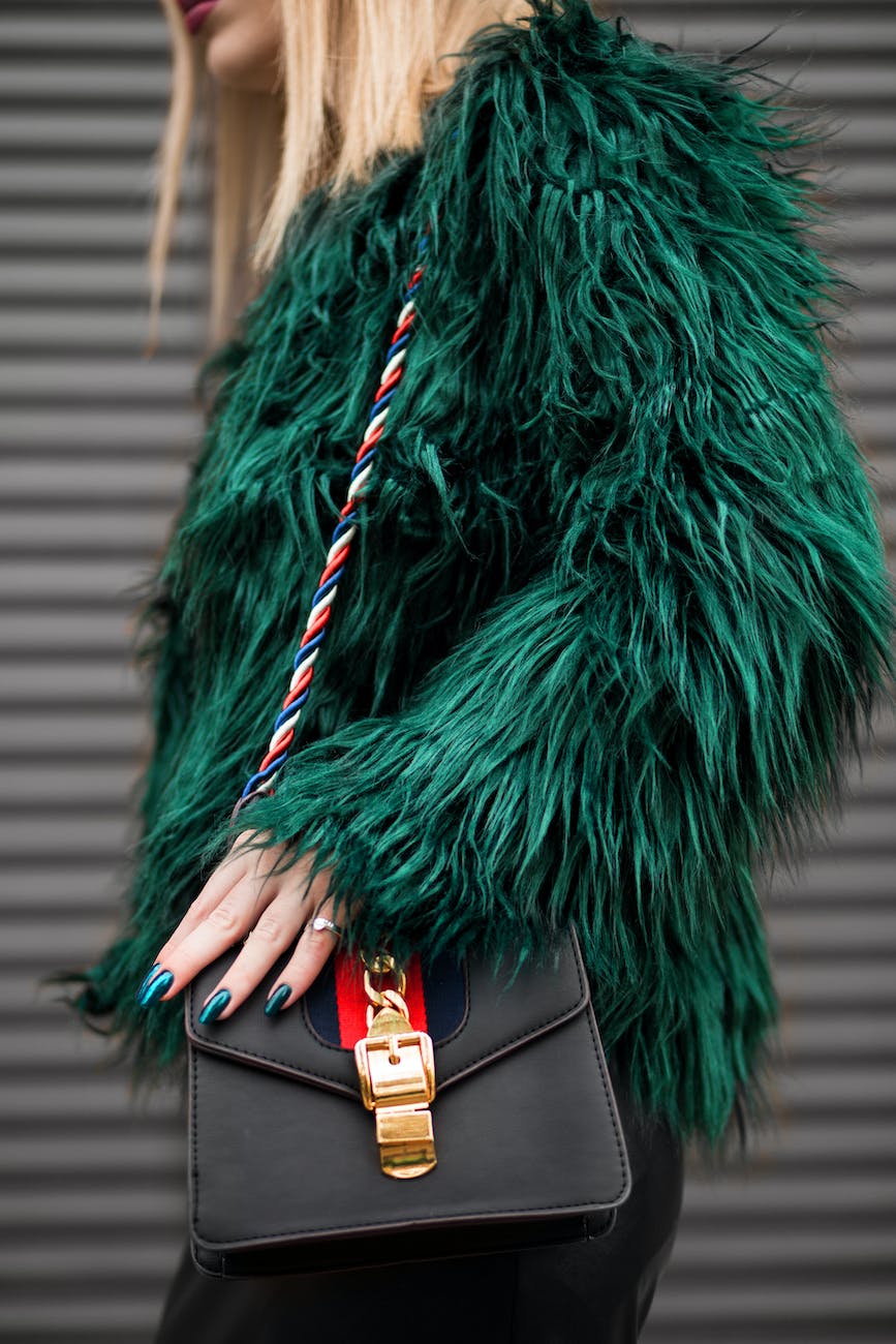 woman wearing green fur jacket