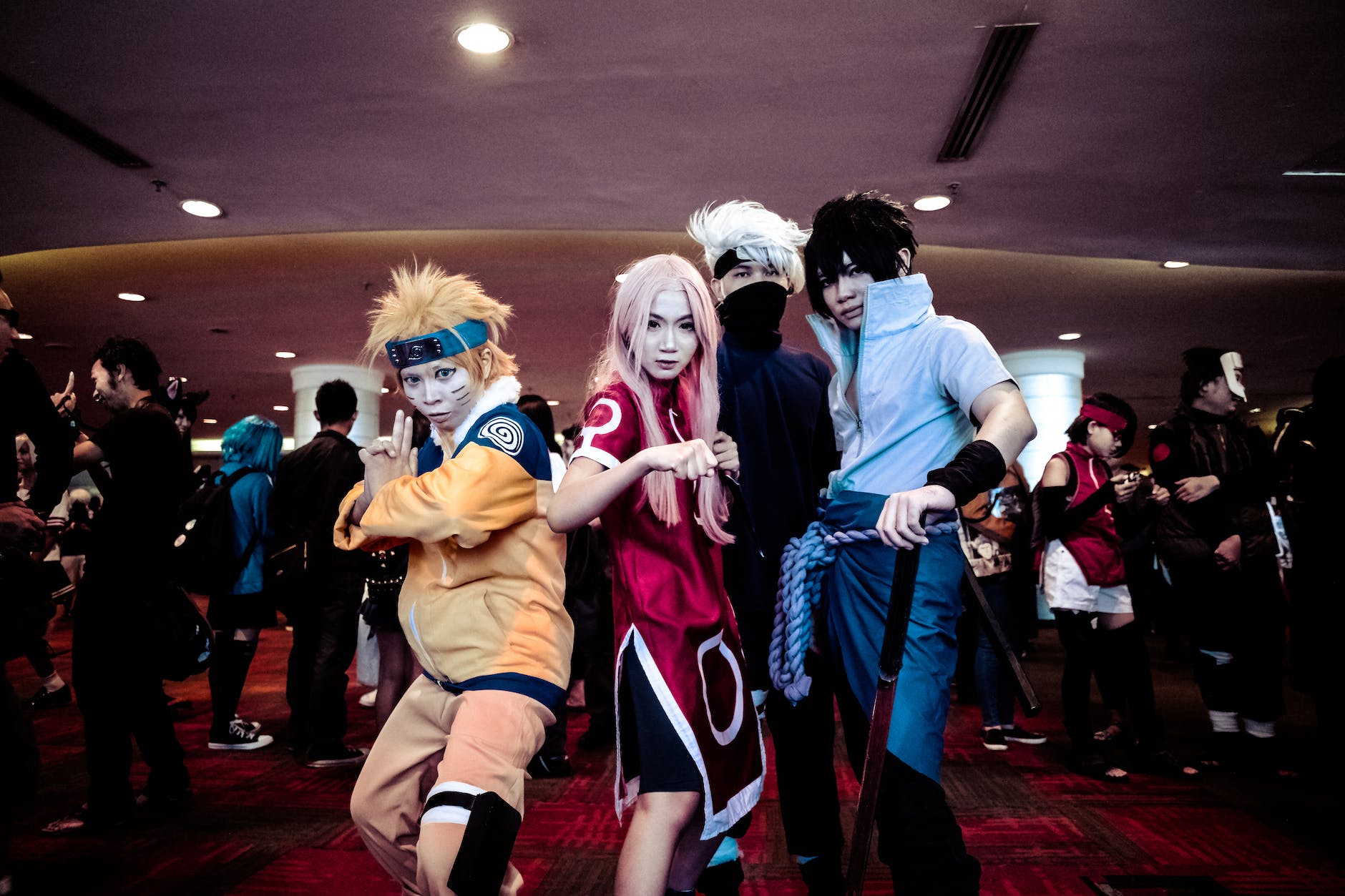 four person in naruto costume