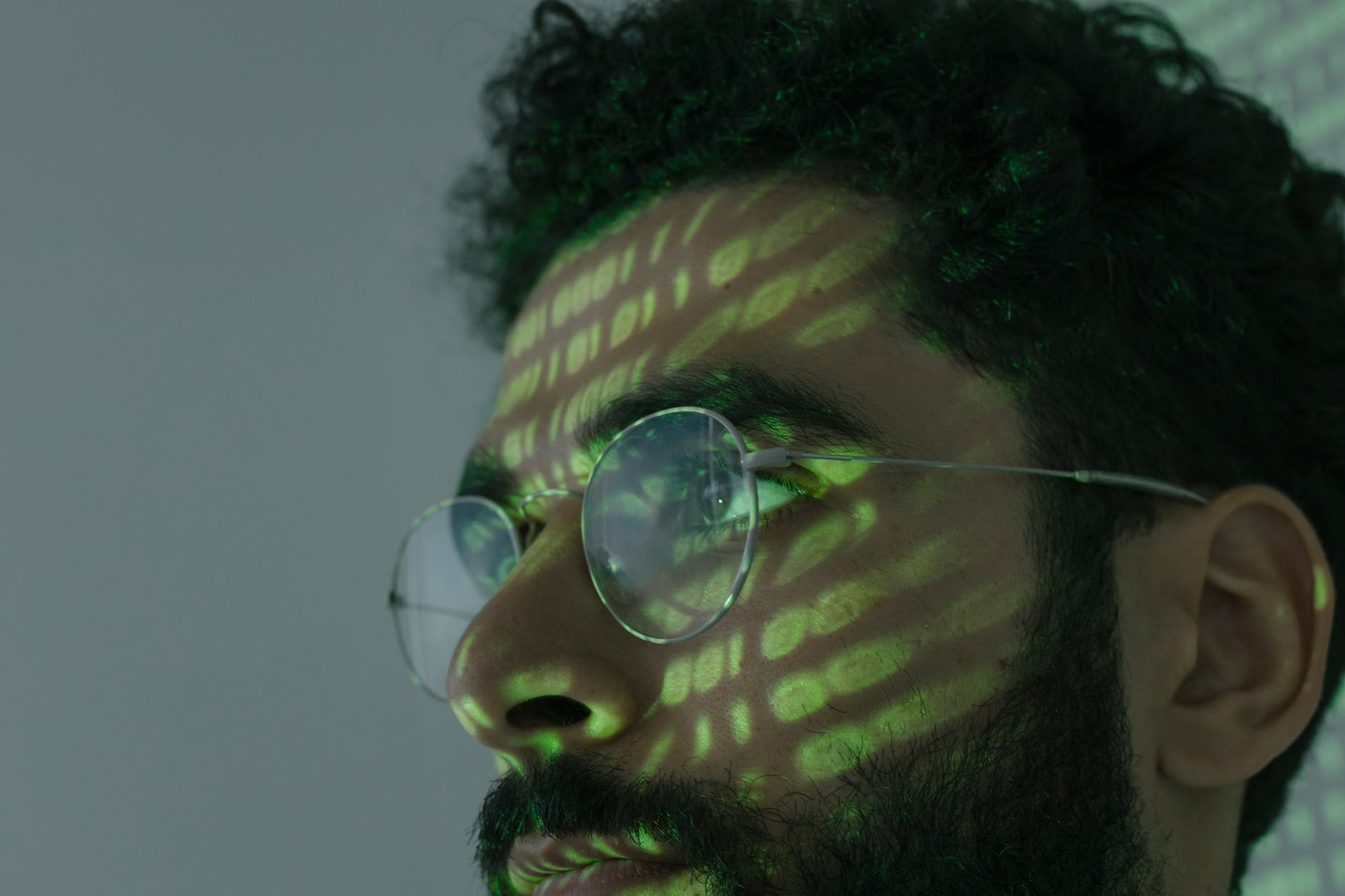 man wearing silver framed eyeglasses