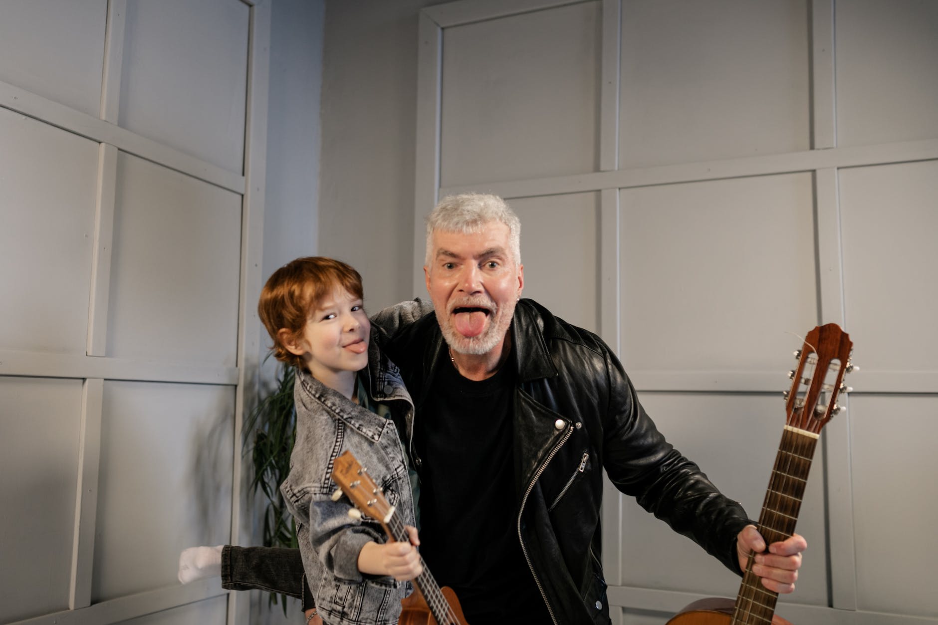 grandfather and grandson having fun